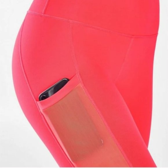 Fabletics On-the-Go High-Waisted Capri in Pop Coral - Picture 2 of 12